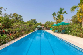 StayVista's Casa Palmera - Pet-Friendly Villa with Pool, Garden with Gazebo, and Indoor & Outdoor Games